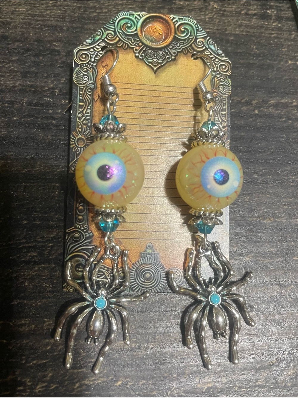 Hand Crafted Yellow Eyeball Earrings with Silver Spider Charms